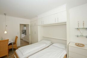 1 Zimmerappartement mit Wandklappbetten