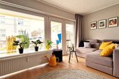 Kombiniertes Appartement mit Sofa und Austritt auf die Terrasse